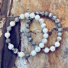 "Stack them up! Stretch beaded bracelets are so easy to wear, either on their own or stacked on your wrist, and they go with just about anything! The white howlite beads in this bracelet are paired with matte grey picasso jasper beads and rose gold plated hematite spacers. It is made with stretch cord to easily slip over the wrist. Choose from either; ~ white howlite with 5 picasso jasper beads, or ~ picasso jasper with 3 white howlite beads Sized to fit approximately 6-1/4\" - 7-1/4\". * please Stretch Beaded Bracelets, Shambala Bracelet, Jasper Bead Bracelet, Mala Beads Bracelet, Howlite Bracelet, Wrist Mala, Picasso Jasper, Choker Pendant, Natural Gemstone Jewelry