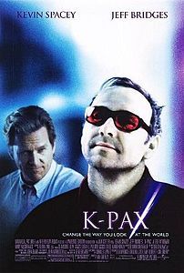 the movie poster for k - pax starring two men in suits and red sunglasses