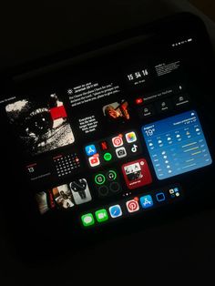 an iphone screen with icons on it in the dark