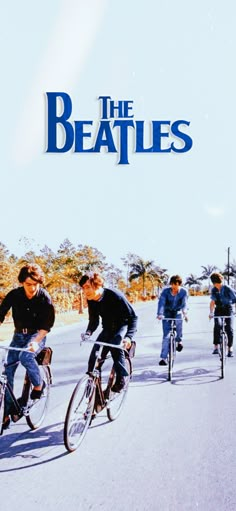 the beatles are riding their bikes down the street in front of some people on bicycles