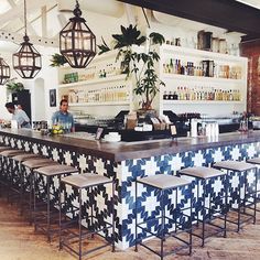 the bar is decorated with blue and white tiles