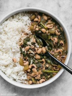 a white bowl filled with rice and beans