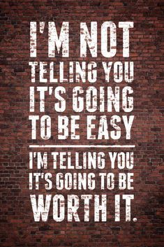 a brick wall with the words i'm not telling you it's going to be easy