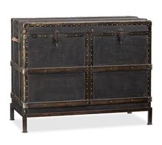 an old chest with metal studs on the front and sides, sitting against a white background