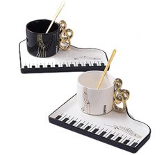 two black and white music themed items on trays