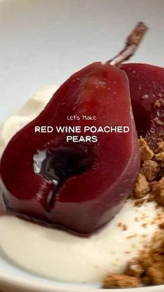 red wine poached pears with yogurt and granola in a white bowl