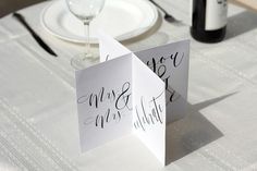 the table is set with two place cards