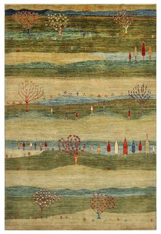 an area rug with trees and houses on it