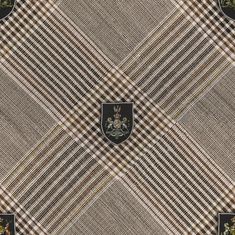 a plaid pattern with a crest on the center and two black patches in the middle