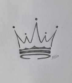 a drawing of a crown on top of a piece of paper