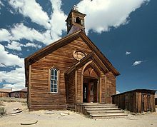 an old wooden church in the middle of nowhere