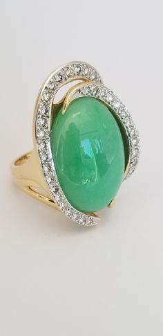 Beautiful jade and diamond ring. Luxury Green Chalcedony Ring, Elegant Oval Chrysoprase Rings, Elegant Formal Jade Rings, Elegant Jade Cabochon Rings, Elegant Jade Rings With Cabochon, Elegant Emerald Jade Ring With Cabochon, Luxury Jade Ring For Formal Occasions, Elegant Chrysoprase Emerald Ring For Anniversary, Elegant Green Evening Rings