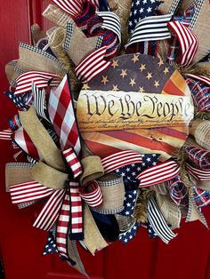 a patriotic wreath with the words we are troops on it and an american flag design