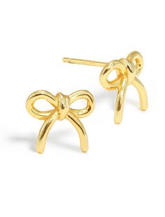 Elevate your holiday style with these sleek and sophisticated HOLIDAY COQUETTE BOW earrings. Showcasing a refined and chic aesthetic, these earrings can be dressed up for formal events or worn casually for a touch of elegance.  INGREDIENTS: 18K gold over sterling silver, or sterling silver  DIMENSIONS: 12 mm wide x 10 mm height Minimal Earrings, Chic Aesthetic, Coquette Bow, Bow Earrings, Holiday Style, Bracelet Collection, Lariat Necklace, Earrings Sterling Silver, Sterling Silver Earrings Studs