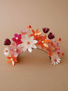 Meadow Headpiece in Pink/Orange. A meadow scene abundant with individually hand-formed acrylic flowers in varying colours and textures. Handmade in the UK by Wolf & Moon. Floral Accessories Hair, Hoop Charms, Wolf Moon, Hand Molding, Floral Headpiece, Acrylic Flowers, Metallic Hair, Floral Hair, Pink Orange