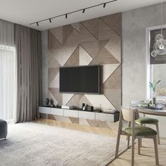 a living room with a tv on the wall next to a dining table and chairs