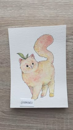 a drawing of a cat with a green leaf on it's head