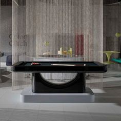 a pool table in the middle of a room