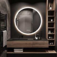 a bathroom with a round mirror above the sink and shelves on the wall next to it