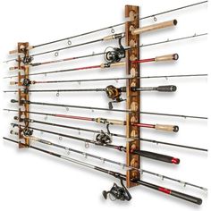 the fishing rod rack is made from wood and holds many different types of fish rods