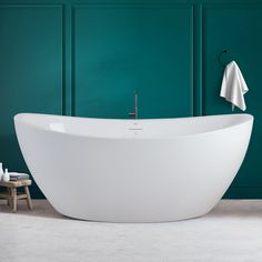 Our bathtubs are ergonomically designed as large freestanding soaking tubs for full-body immersion that re-energize body and soul and enhance your sense of wellbeing. FerdY Naha 31.1-in x 66.9-in White Acrylic Oval Freestanding Soaking Bathtub with Drain (Center Drain) | FERDY-02588-1700-BN Oval Bathtub, Bath Store, Soaking Bathtubs, Steam Showers, Floor Drains, Relaxing Bath, Bathtubs, Free Standing Bath, Naha