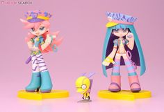 two anime figurines are shown side by side, one is pink and the other is blue