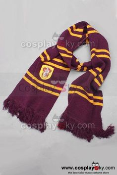 a harry potter scarf with yellow and red stripes on the front, sitting on a white surface