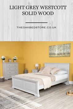 a bedroom with yellow walls and white furniture in the foreground text reads light grey westcott solid wood