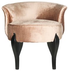 a round chair with black legs and a pink velvet upholstered seat