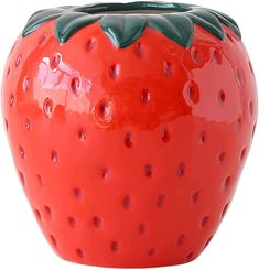 a ceramic strawberry planter is shown on a white background