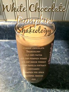 white chocolate pumpkin shake in a glass with the words, white chocolate pumpkin shakeology