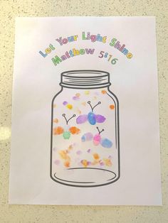 a drawing of a glass jar filled with colorful confetti and the words let your light shine on it