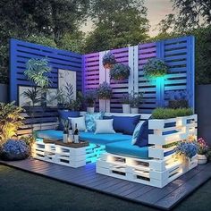 a blue couch sitting on top of a wooden deck