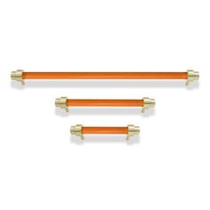 two orange and gold handles on white background