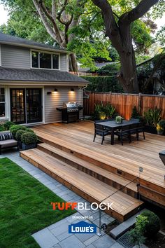 a wooden deck in front of a house