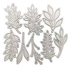 some cut outs with leaves and spoons on them