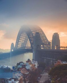 the sydney harbour bridge is seen in this photo