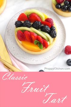 a close up of fruit tarts on a plate