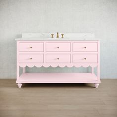 a bathroom with a pink vanity and white counter top on wooden floor next to wall