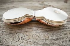 an open book sitting on top of a wooden table