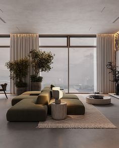 a modern living room with large windows overlooking the city