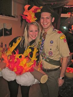 a man and woman dressed up in costumes