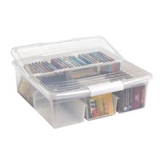 a plastic storage box filled with lots of books