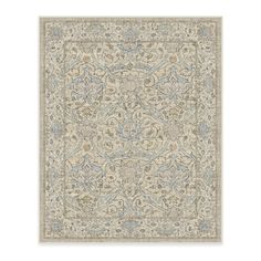 a beige rug with blue and green designs on the bottom, in an ornate pattern