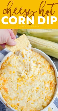 a cheesy hot corn dip in a white bowl