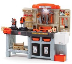 a toy kitchen with lots of tools in it