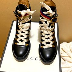 Gucci Black Combat Boots, Very Comfortable In Excellent Condition With Box, Duster Bags And Extra Laces. Brand New $1100 Now. Black Gucci Boots With Branded Heel, Gucci Designer Black Boots, Designer Black Gucci Boots, Black Designer Gucci Boots, Chic Black Gucci Boots, Gucci Black Luxury Boots, Luxury Black Gucci Boots, Gucci Women Shoes, Gucci Women