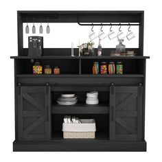 a black buffet table with plates and cups on it's top, next to utensils