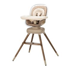 a high chair with a baby seat on it's legs and one foot in the middle