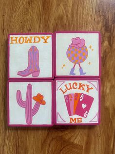 four square coasters with images of cowboy boots, cactus, and heart on them